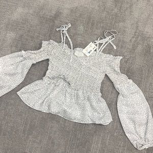 Black and white polka dot blouse